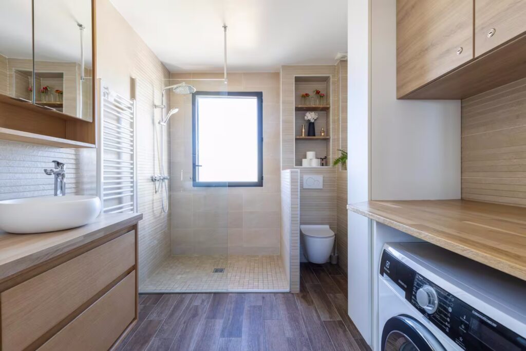 Photo salle de bain avec coin buanderie